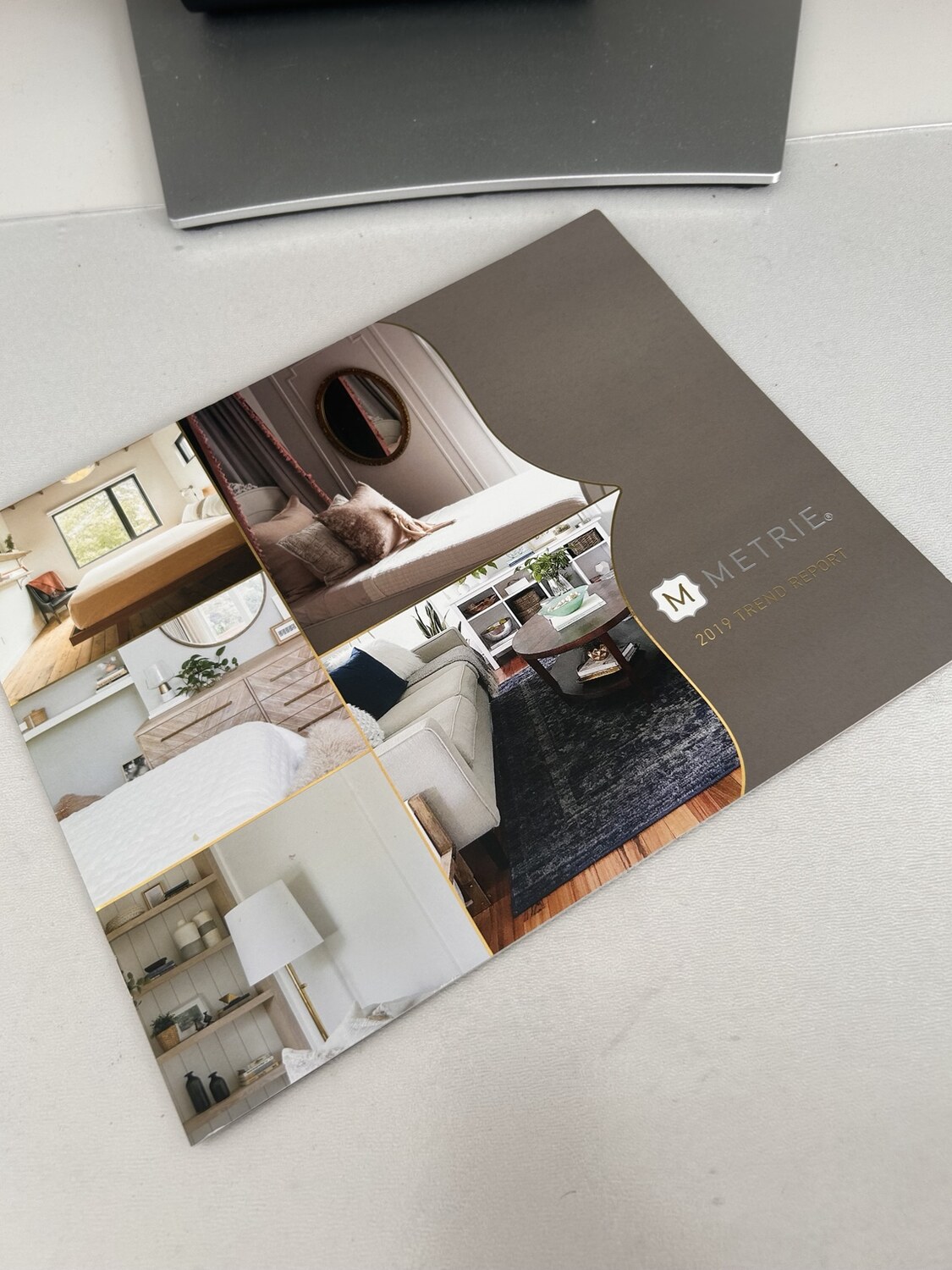 Metrie 2019 Trend Report photographed on a worktable